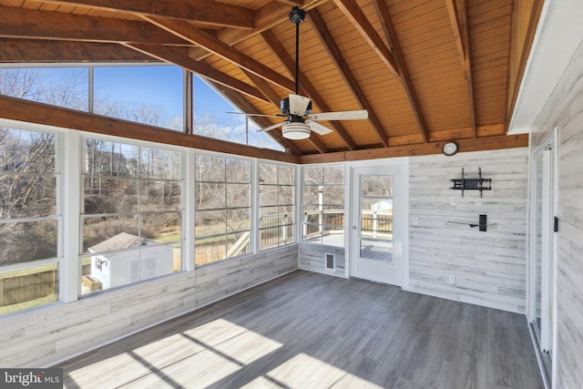 unfurnished sunroom featuring wooden ceiling, vaulted ceiling with beams, and a ceiling fan