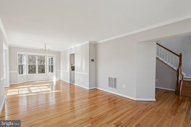 unfurnished living room featuring visible vents, baseboards, a chandelier, stairway, and light wood-type flooring