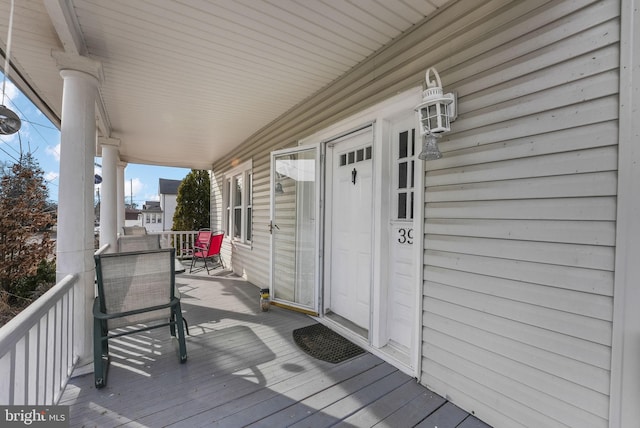 wooden deck with a porch