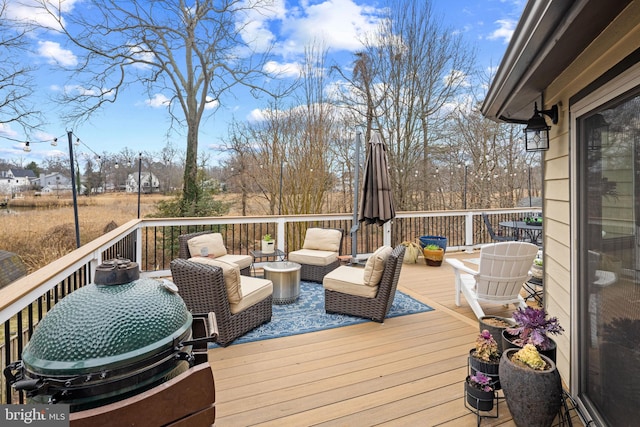 deck featuring outdoor lounge area