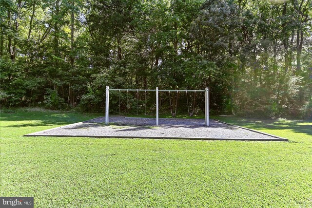 view of play area featuring a lawn