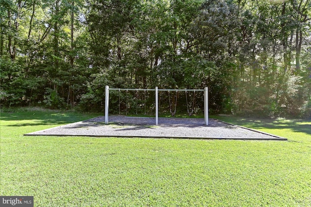 view of playground featuring a lawn