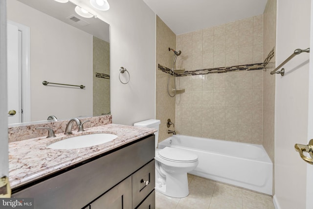 full bath featuring tile patterned flooring, toilet, vanity, visible vents, and shower / washtub combination