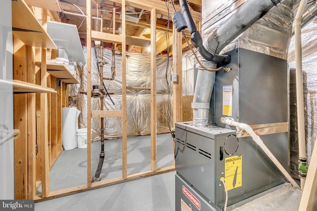 utility room with heating unit