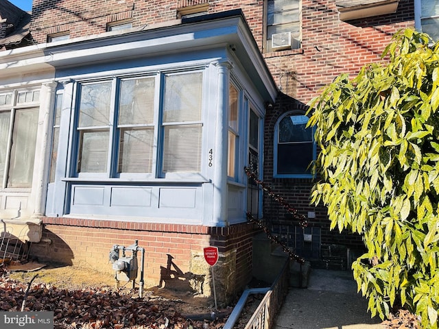 view of home's exterior featuring brick siding