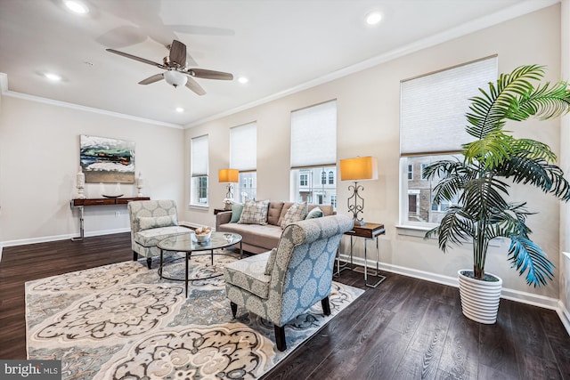 living area featuring ornamental molding, recessed lighting, wood finished floors, and baseboards