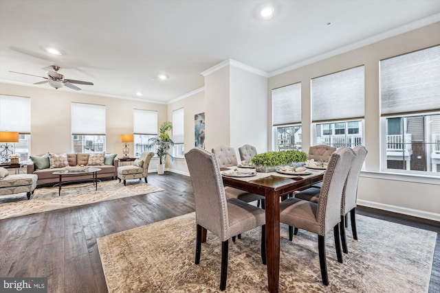 dining area featuring baseboards, a ceiling fan, dark wood-type flooring, crown molding, and recessed lighting