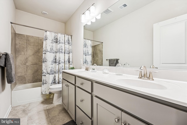 full bathroom with double vanity, visible vents, toilet, and a sink