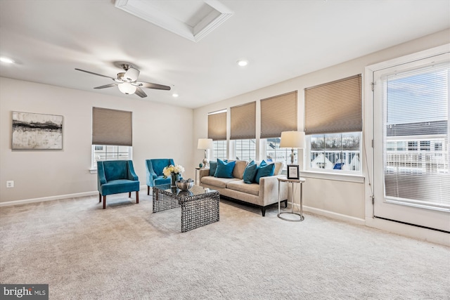 carpeted living area featuring ceiling fan, recessed lighting, attic access, and baseboards