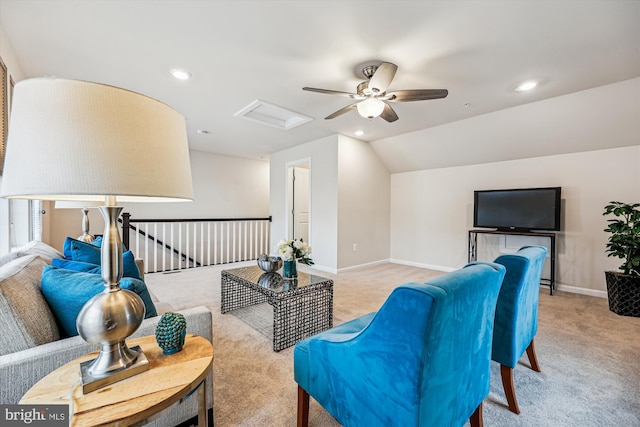 living area with lofted ceiling, recessed lighting, carpet flooring, baseboards, and attic access