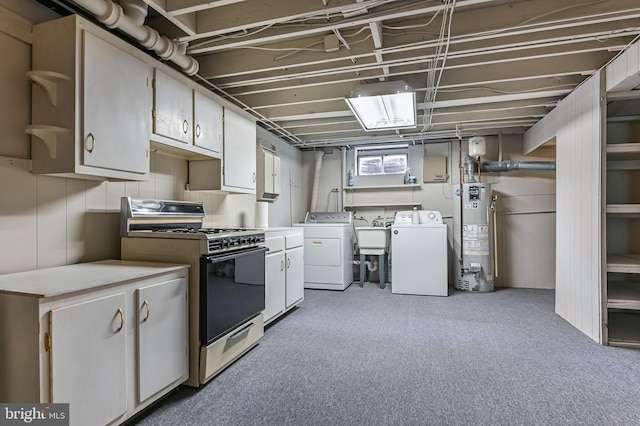 kitchen with washer and clothes dryer, open shelves, water heater, range with gas cooktop, and light countertops