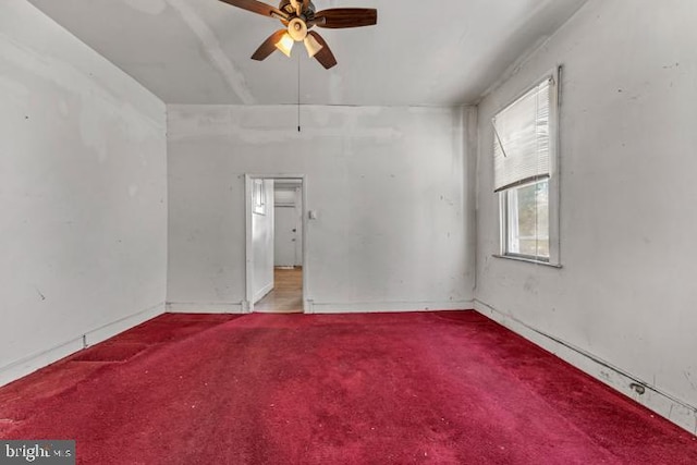 unfurnished room featuring carpet flooring and ceiling fan