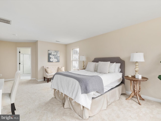 bedroom featuring carpet floors, visible vents, and baseboards