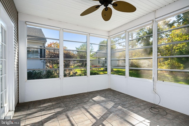 unfurnished sunroom with plenty of natural light