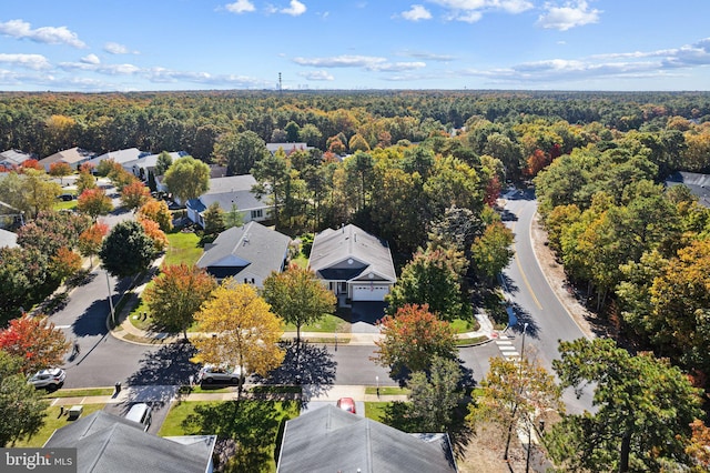 bird's eye view with a residential view and a forest view