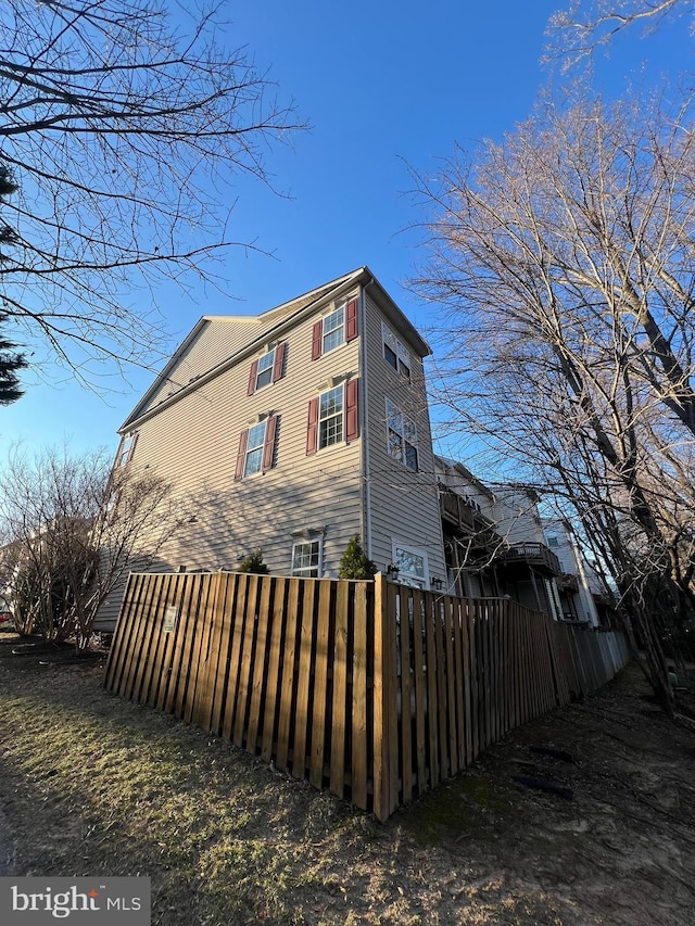 view of side of property with a fenced front yard