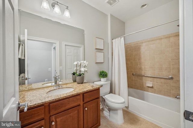 bathroom with tile patterned flooring, toilet, vanity, visible vents, and shower / bathtub combination with curtain