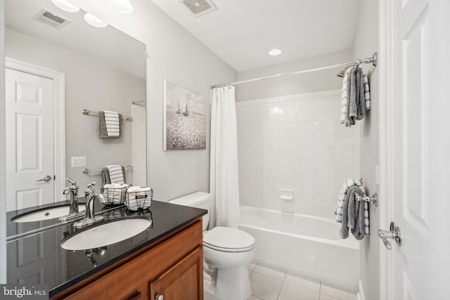 full bathroom featuring toilet, tile patterned flooring, visible vents, and shower / tub combo with curtain