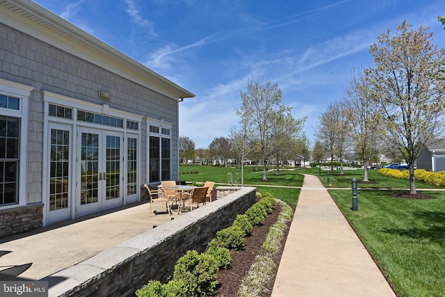 exterior space featuring a yard and a patio