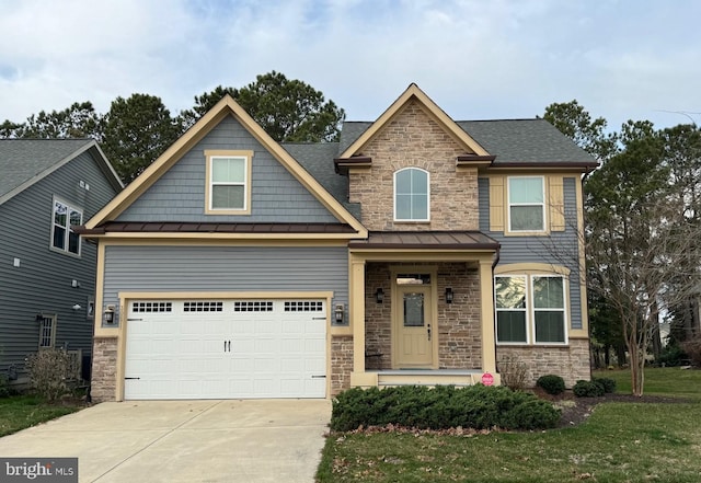 craftsman-style home featuring a standing seam roof, stone siding, roof with shingles, concrete driveway, and metal roof