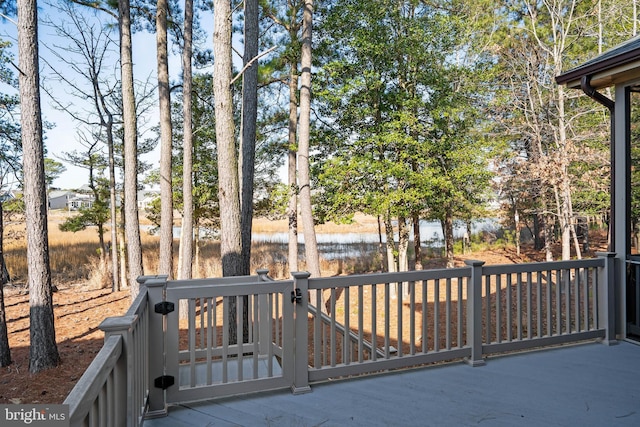 deck featuring a water view