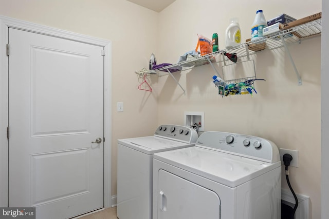 laundry area featuring laundry area and separate washer and dryer