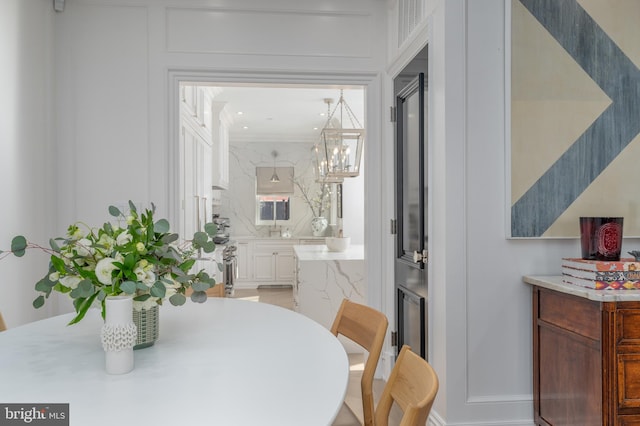 dining area with a chandelier