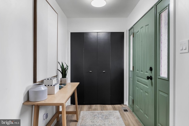 entrance foyer featuring light wood-style flooring