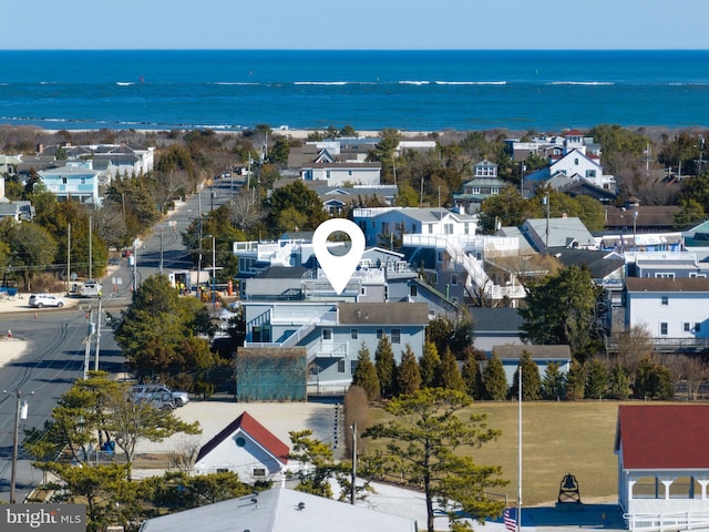 aerial view featuring a residential view and a water view