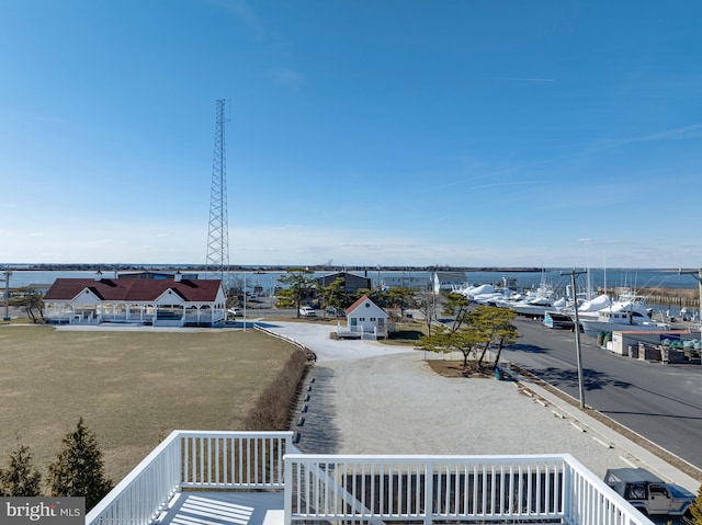 birds eye view of property featuring a water view