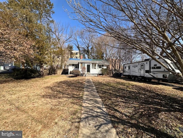 view of front of home with a front lawn