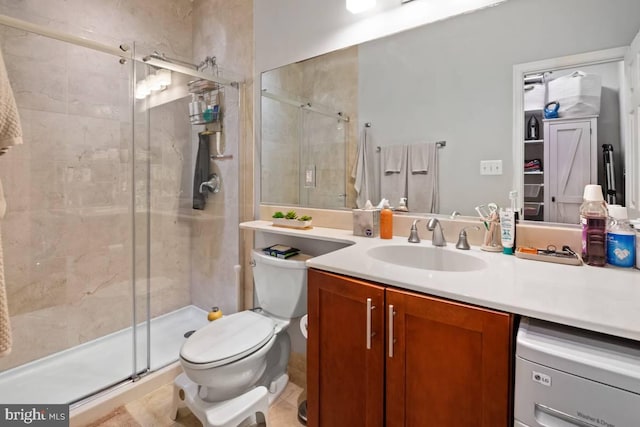 full bathroom with toilet, a shower stall, and vanity