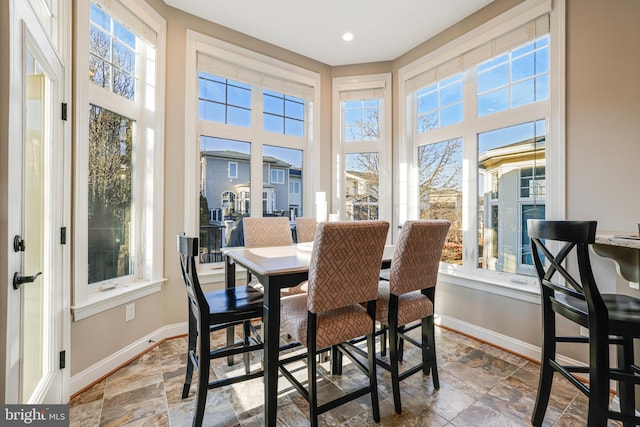 sunroom featuring a wealth of natural light