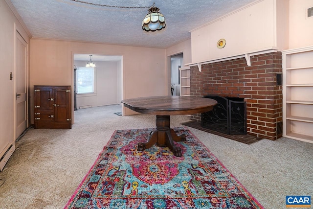 dining space with a textured ceiling, a brick fireplace, visible vents, and light colored carpet