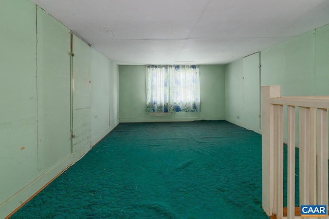 spare room featuring carpet floors