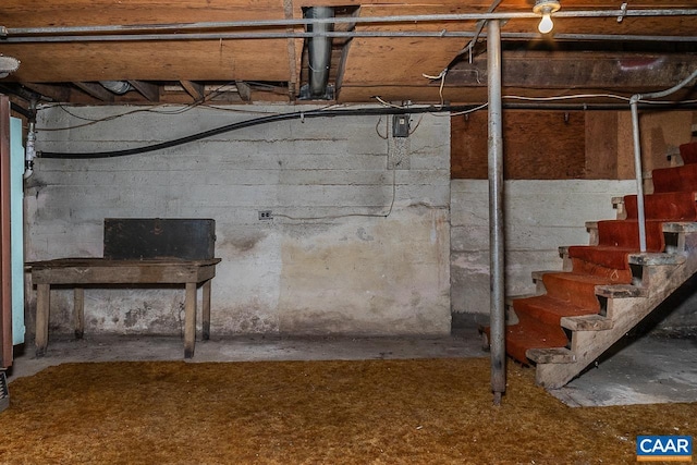 unfinished basement with stairway