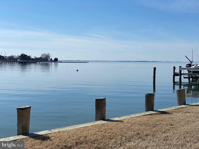 view of dock with a water view