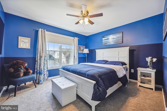 bedroom featuring ceiling fan, baseboards, and carpet flooring