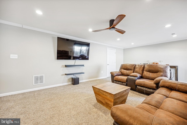 carpeted living area featuring recessed lighting, visible vents, crown molding, and baseboards