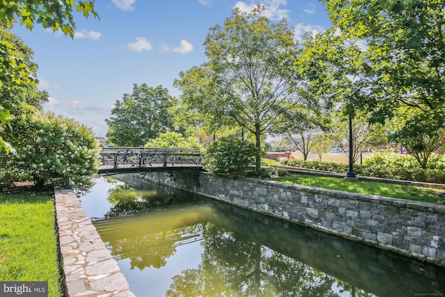 view of property's community featuring a water view