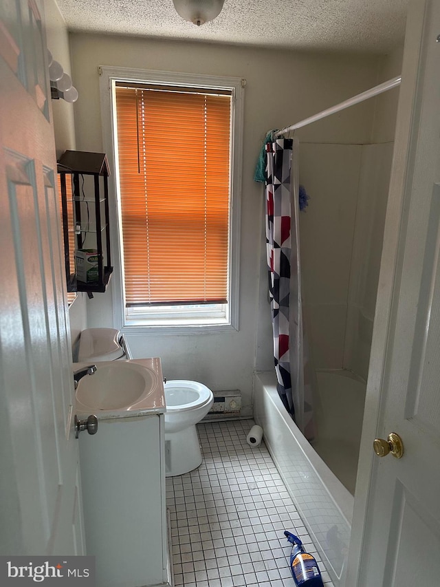 full bathroom with toilet, tile patterned floors, shower / bathtub combination with curtain, a textured ceiling, and vanity