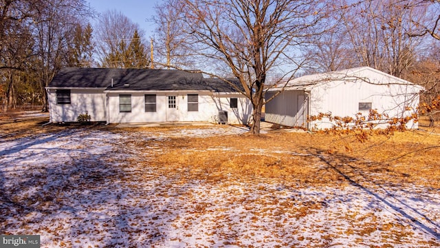 ranch-style house with cooling unit