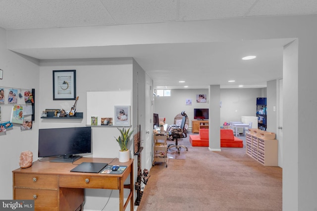 office area featuring a paneled ceiling, recessed lighting, and light colored carpet