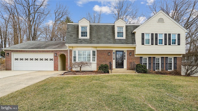 view of front of property featuring driveway, brick siding, roof with shingles, an attached garage, and a front yard