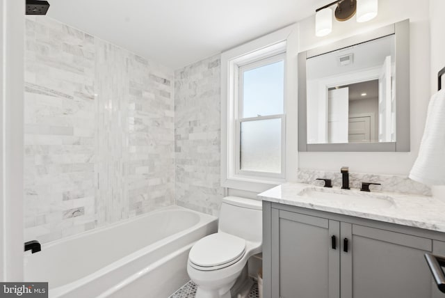 full bath with bathtub / shower combination, visible vents, vanity, and toilet