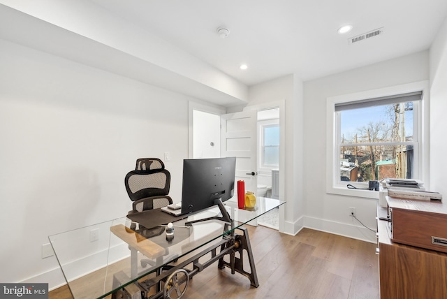 office with recessed lighting, wood finished floors, visible vents, and baseboards