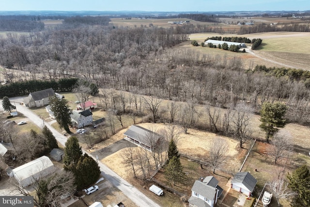 birds eye view of property featuring a rural view