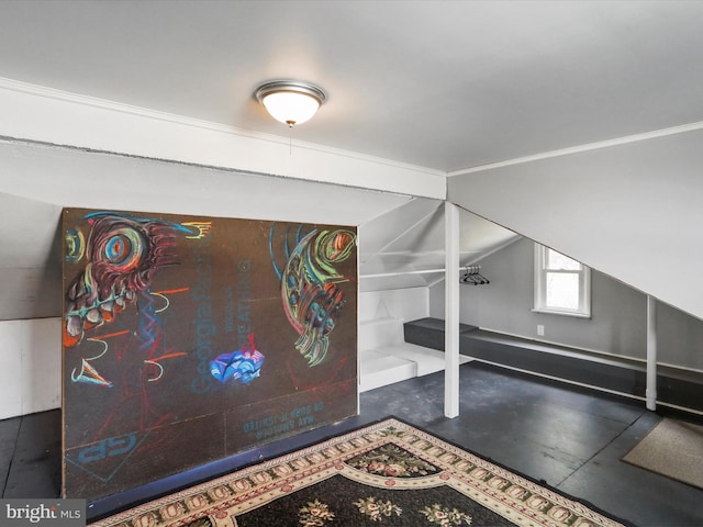 interior space with lofted ceiling and concrete flooring