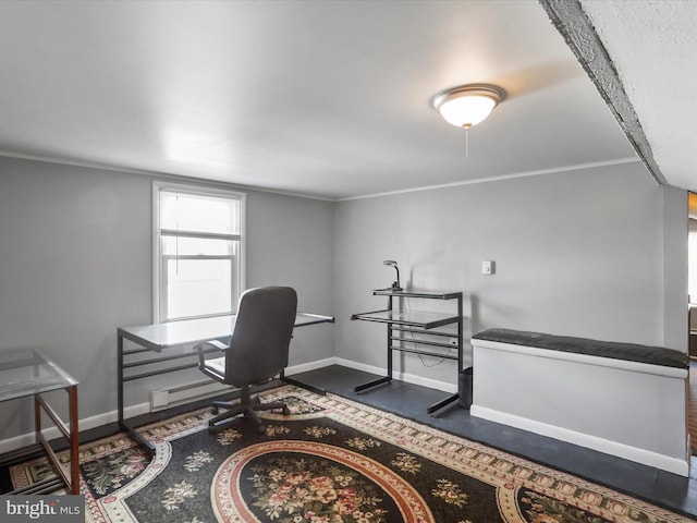 office area with crown molding and baseboards