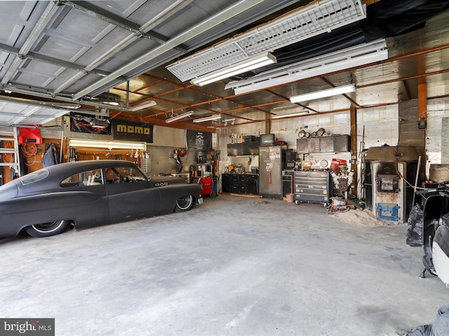 garage with a workshop area